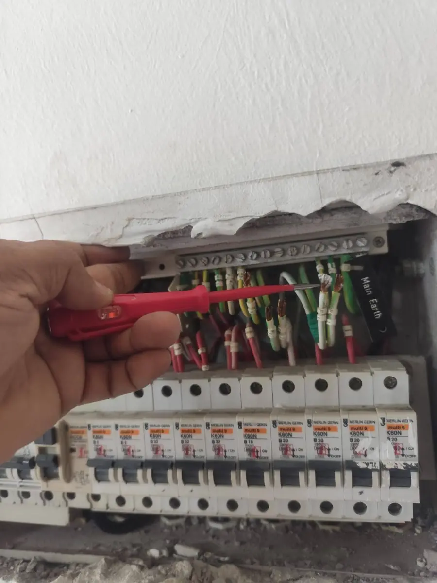 SG Electrician rewiring a distribution board (DB box) at a Singapore home